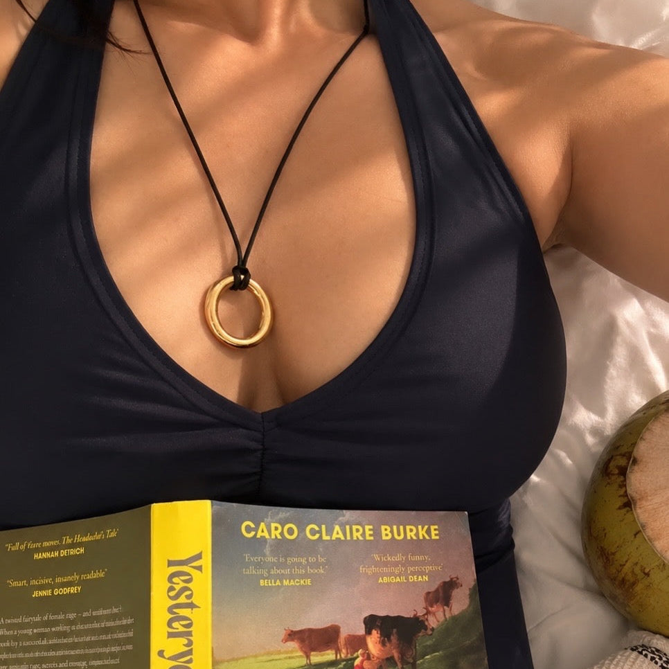The 2026 Accessory Wave Belongs to Silk Scarves & Cord Pendant Necklaces